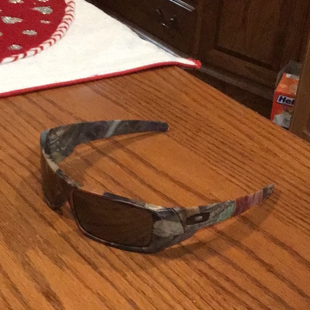 Oakley Green and Brown Sunglasses with Sporty Wrap-Around Style